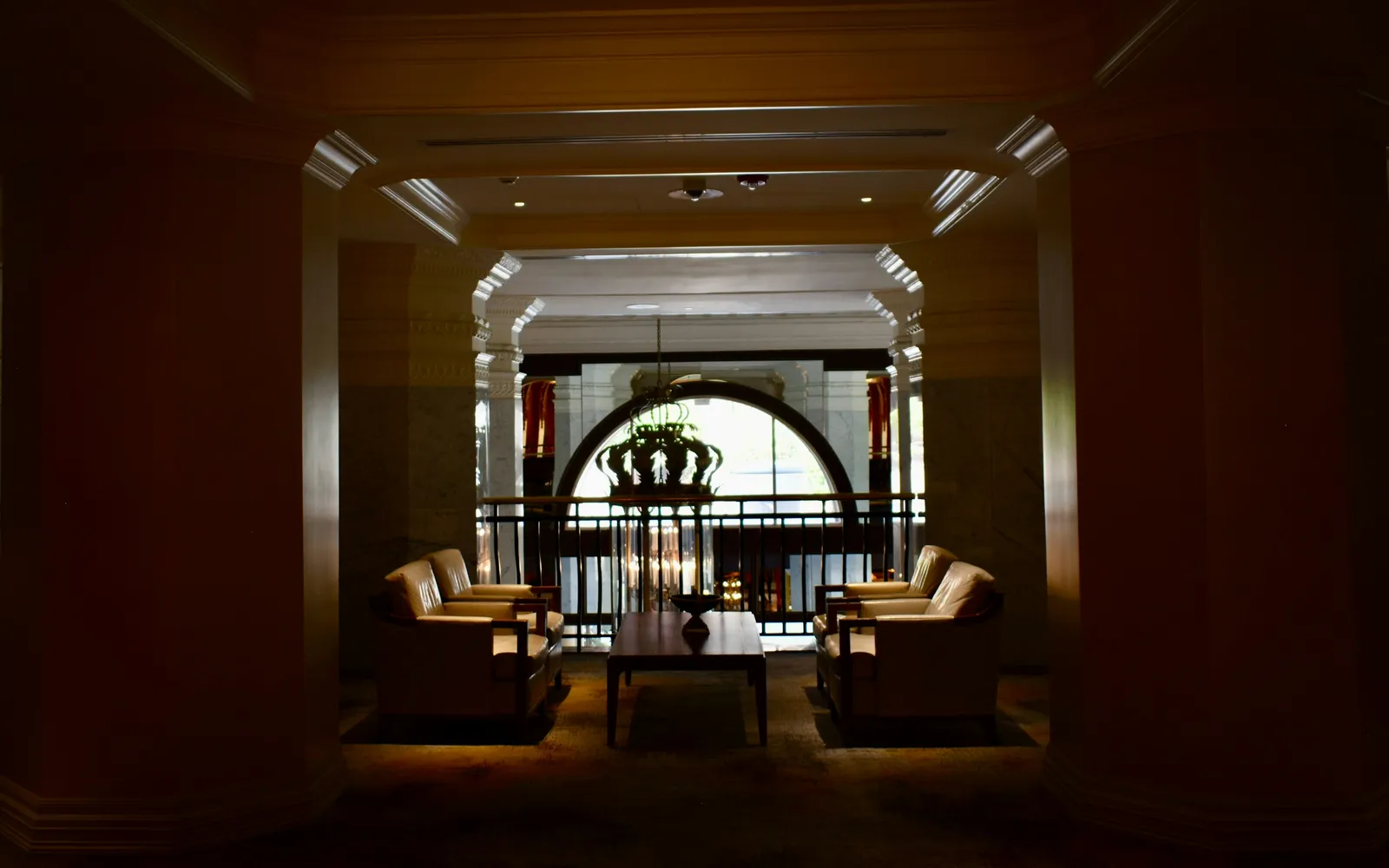 A warmly lit hotel corridor